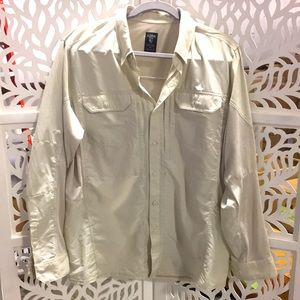 Men’s Kuhl medium long sleeve cream shirt. Has pockets.